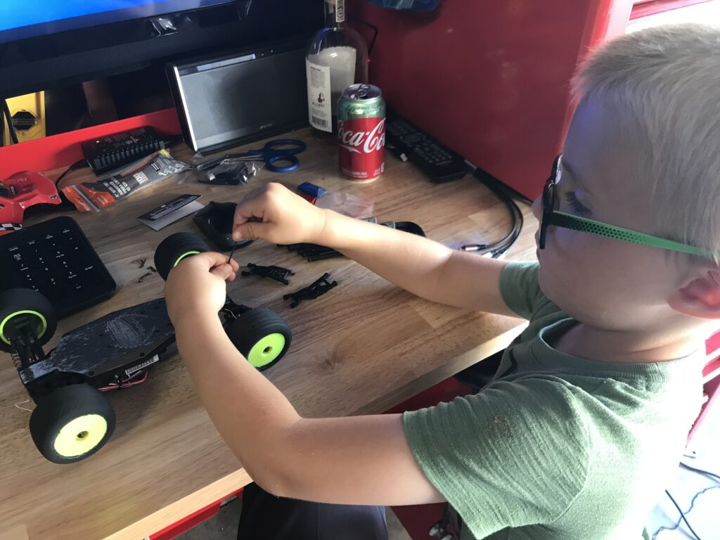 Josh fixing RC car